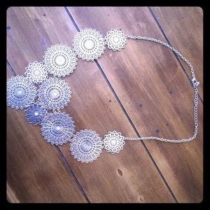 Fun silver necklace.